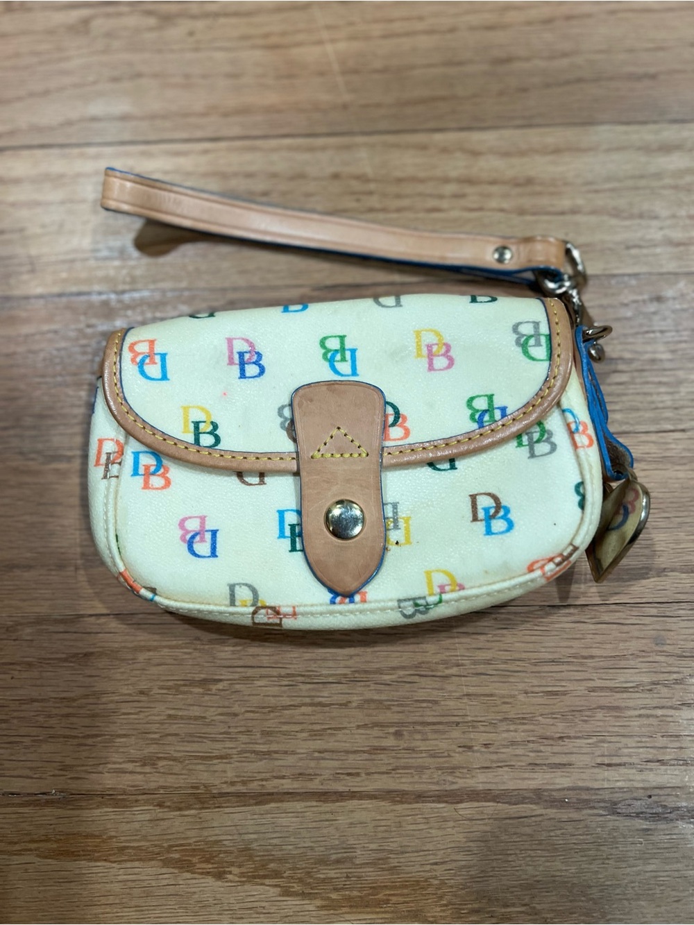 Dooney & Bourke Cream Wristlet with Multicolor DB Print